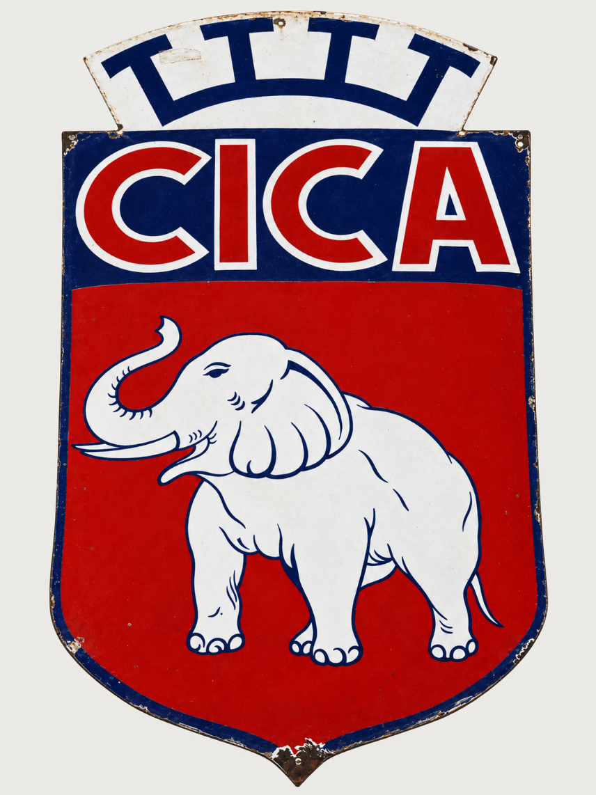 Emblema da CICA em metal e esmalte, com um elefante branco.